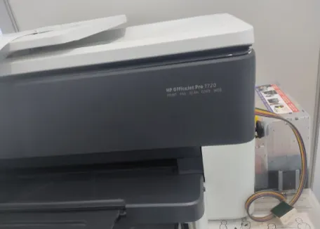 HP 7720 프린터와 무한잉크 공급기
