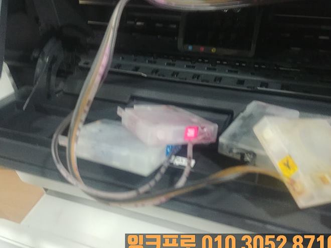 HP 7740 잉크 공급 장치와 카트리지 점검